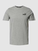 PUMA PERFORMANCE T-Shirt mit Label-Print in Mittelgrau Melange, Größe ...