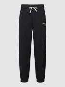 CHAMPION Sweatpants mit Label-Stitching in Black, Größe M