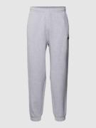 Lacoste Loose Fit Sweatpants mit elastischem Bund in Hellgrau Melange,...