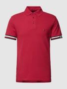 Tommy Hilfiger Poloshirt mit Label-Schriftzug in Kirsche, Größe L