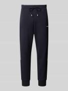 BOSS Green Sweatpants mit Label-Schriftzug Modell 'Hadikonos' in Marin...