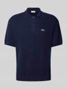 Lacoste Relaxed Fit Poloshirt mit Logo-Badge in Dunkelblau, Größe M