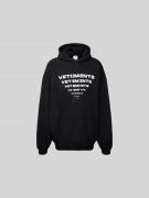 VETEMENTS Oversized Hoodie mit Label-Print in Black, Größe L