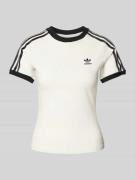 adidas Originals T-Shirt mit labeltypischen Streifen in Weiss, Größe X...