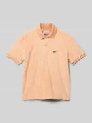 Lacoste Poloshirt mit Label-Detail in Apricot, Größe 140