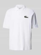Lacoste Loose Fit Poloshirt mit Logo-Patch in Weiss, Größe S