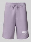Hugo Blue Shorts mit Allover-Muster in Flieder, Größe M