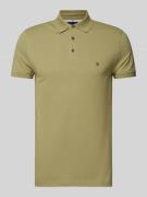 Tommy Hilfiger Slim Fit Poloshirt mit Label-Stitching in Oliv, Größe S
