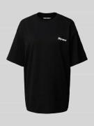 Review Oversized T-Shirt mit Label-Print in Black, Größe XS