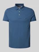 Tommy Hilfiger Slim Fit Poloshirt mit Logo-Stitching in Jeansblau, Grö...