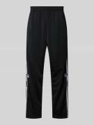 adidas Originals Flared Sweatpants mit Label-Stitchings Modell 'ADIBRE...