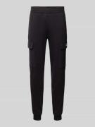 EA7 Emporio Armani Sweatpants mit Label-Print in Black, Größe L