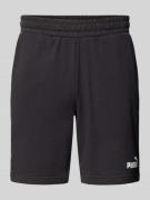 PUMA PERFORMANCE Regular Fit Sweatshorts mit Label-Print in Black, Grö...