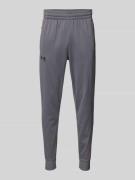 Under Armour Slim Fit Sweatpants mit Logo-Print in Anthrazit, Größe L