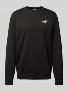 PUMA PERFORMANCE Sweatshirt mit Label-Stitching in Black, Größe L