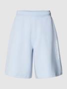 CK Calvin Klein Regular Fit Sweatshorts im unifarbenen Design in Hellb...