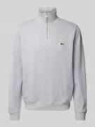 Lacoste Sweatshirt mit Troyer-Kragen in Silber Melange, Größe L