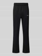 CHAMPION Sweatpants mit elastischem Bund in Black, Größe S