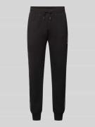 Guess Activewear Sweatpants mit Label-Detail Modell 'MICKEY' in Black,...