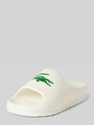 Lacoste Slides mit Label-Print Modell 'CROCO' in Offwhite, Größe 10