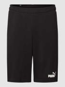 PUMA PERFORMANCE Sweatshorts mit Label-Print Modell 'ESS' in Black, Gr...