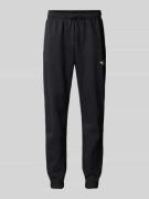 The North Face Regular Tapered Fit Sweatpants mit Label-Print in Black...
