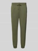 CHAMPION Sweatpants mit elastischem Bund in Oliv, Größe L