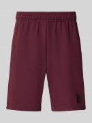 CHAMPION Sweatshorts mit Logo-Print Modell 'TAPE' in Bordeaux, Größe L