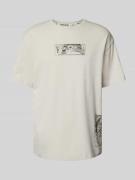 adidas Sportswear T-Shirt mit Motiv-Print in Beige, Größe L