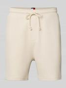 Tommy Jeans Relaxed Fit Sweatshorts mit Strukturmuster in Sand, Größe ...
