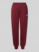 PUMA Slim Fit Sweatpants mit Label-Stitching in Bordeaux, Größe L