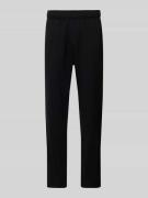 CHAMPION Sweatpants mit elastischem Bund in Black, Größe L