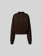 ROTATE Oversized Sweatshirt mit Polokragen in Dunkelbraun, Größe L
