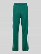 adidas Originals Sweatpants mit elastischem Bund in Gruen, Größe L