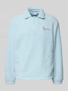 KARL KANI Teddyfell Sweatshirt mit Umlegekragen und Knopfleiste in Hel...