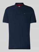 Tommy Jeans Regular Fit Poloshirt aus reiner Baumwolle in Marine, Größ...