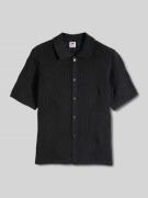 Levi's® Regular Fit Kurzarmhemd aus reiner Baumwolle in Black, Größe L