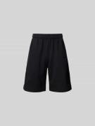 VETEMENTS Loose Fit Sweatshorts mit Gesäßtasche in Black, Größe M