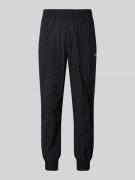 BLKVIS Relaxed Fit Trackpants mit Label-Stitching in Black, Größe S