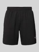 PUMA PERFORMANCE Shorts mit Logo-Stitching in Black, Größe L