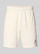CHAMPION Shorts mit Logo und elastischem Bund in Offwhite, Größe L