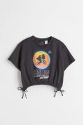 H&M T-Shirt mit Tunnelzug Schwarz/E.T., T-Shirts & Tops in Größe 158/1...