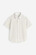H&M Kurzarmhemd aus Baumwolle Weiß/Kariert, T-Shirts & Tops in Größe 9...