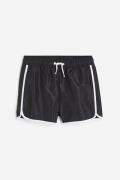 H&M Badeshorts aus Nylon Schwarz/Weiß in Größe 134/140. Farbe: Black/w...