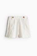 H&M Shorts mit Zierknöpfen Weiß in Größe 42. Farbe: White