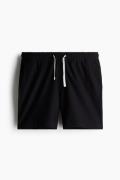 H&M Pikeeshorts in Regular Fit Größe XS. Farbe: Black